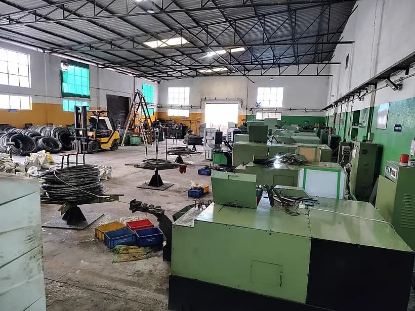 Forging shop with wire coils staged for the next run
