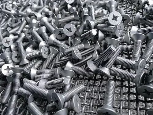Countersunk screws in a wire basket