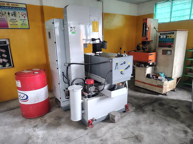 The EDM machine in the tool room